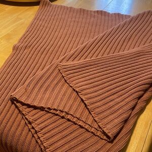 Large cable throw blanket.